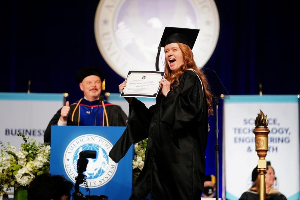 Dr. Smith celebrating at a graduation ceremony