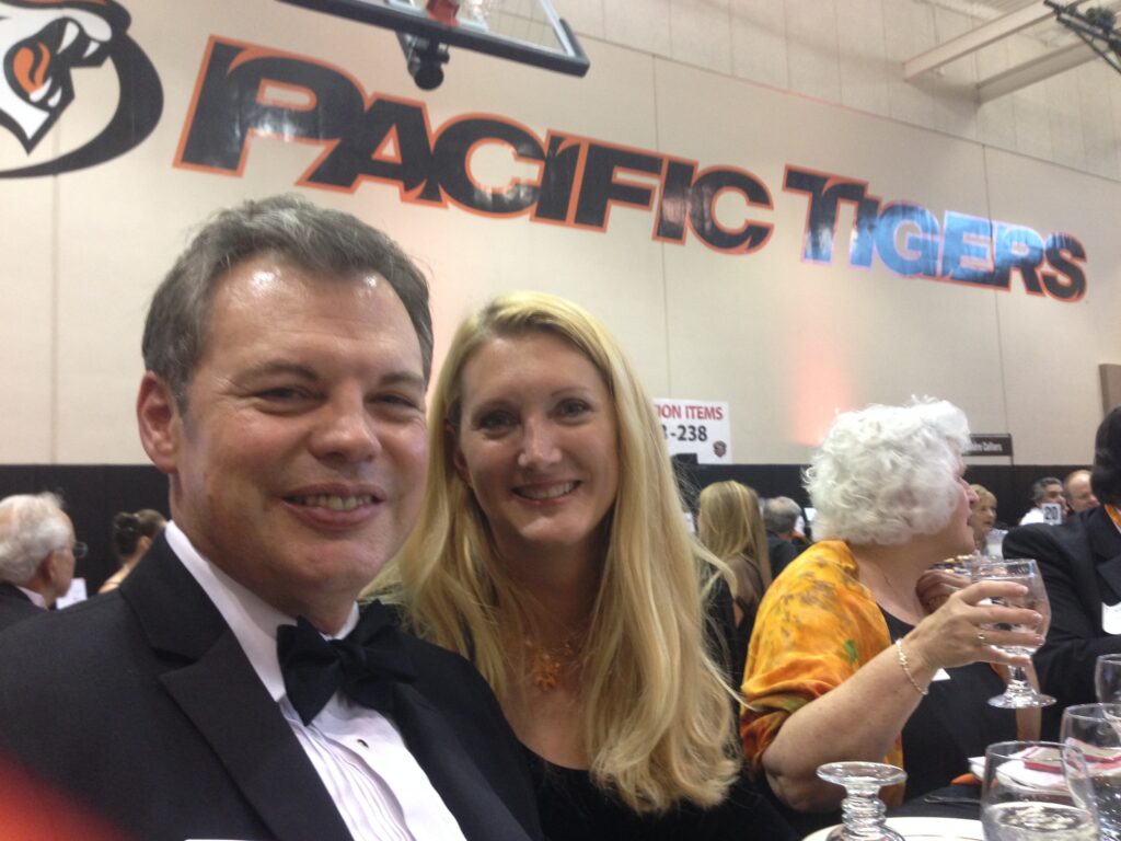 Dr. Smith with his wife at an event